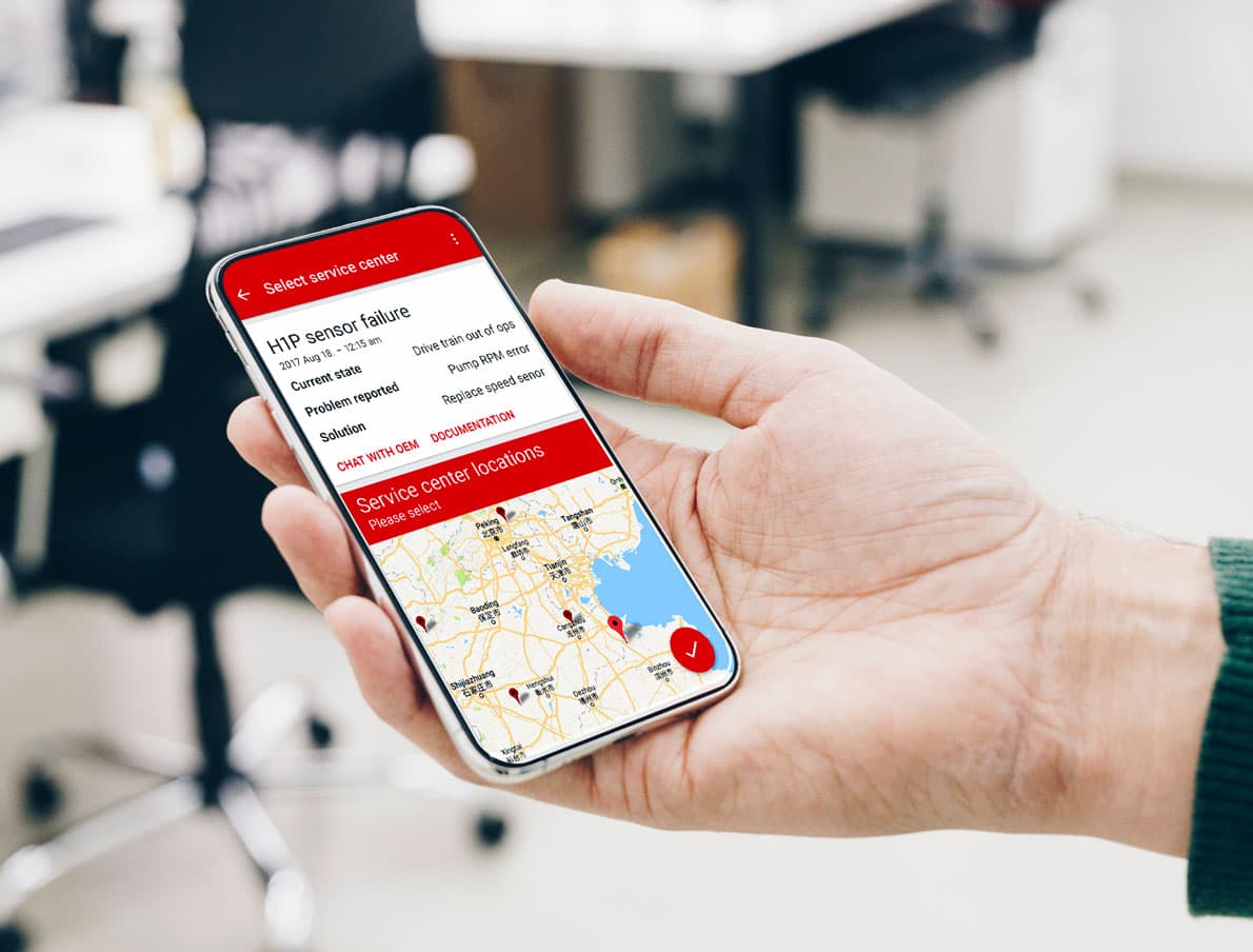Ein Smartphone auf der der Danfoss Predictive Maintenance Prototyp gezeigt wird